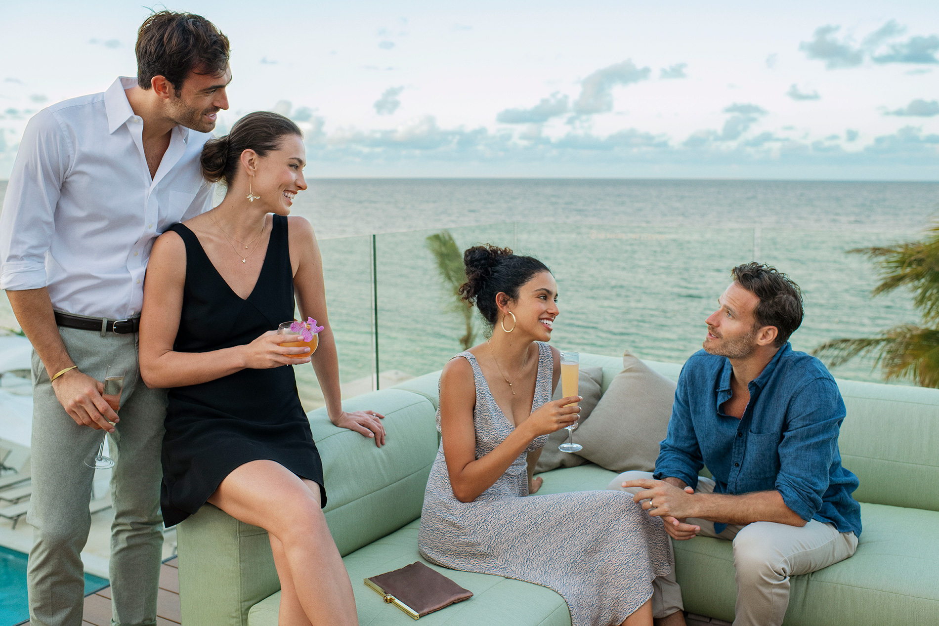 Staff enjoying a company retreat on a rooftop terrace Staff enjoying a company retreat on a rooftop terrace
